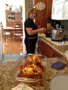 Phyllis showing me how to make the best enchiladas. Click photo or link for recipe...